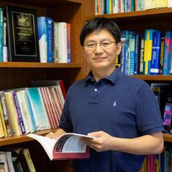 Zhenfei Guan, Associate Professor of Ag Economics
